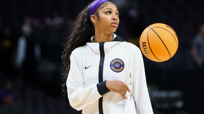 Apr 2, 2023; Dallas, TX, USA; LSU Lady Tigers forward Angel Reese (10) stands on the court during warmups prior to the game against the Iowa Hawkeyes in the final round of the Women's Final Four NCAA tournament at the American Airlines Center. Mandatory Credit: Kevin Jairaj-USA TODAY Sports